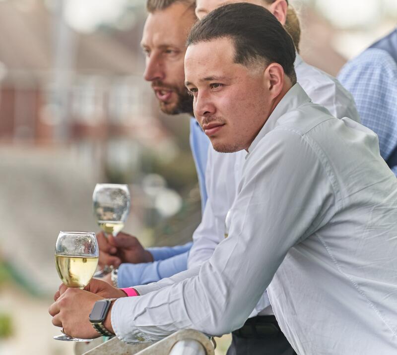 Hospitality guests enjoying a refreshing beverage.